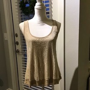 Cream color lace over beige top